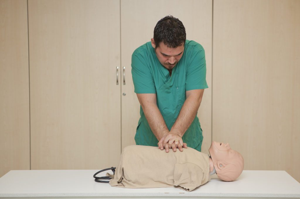 Basic life support training with a CPR Dummy-cardiac massage